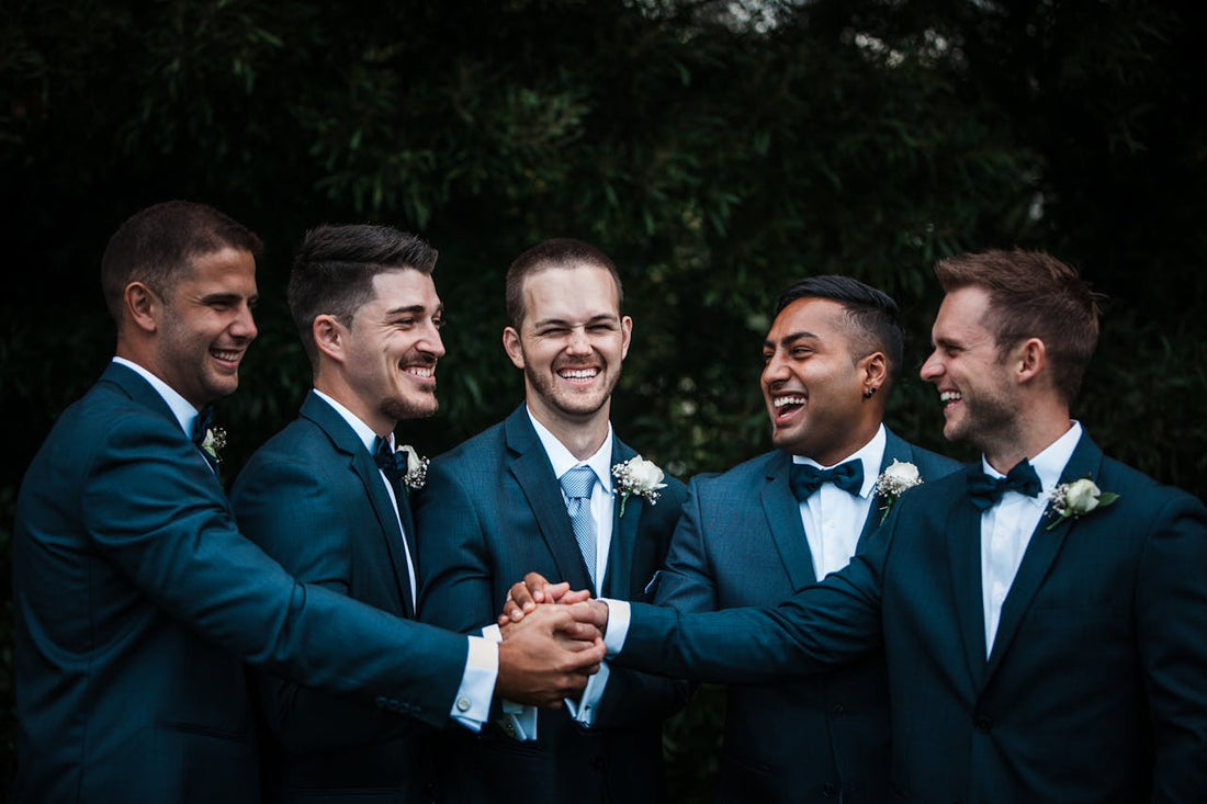 happy groom with groomsmen