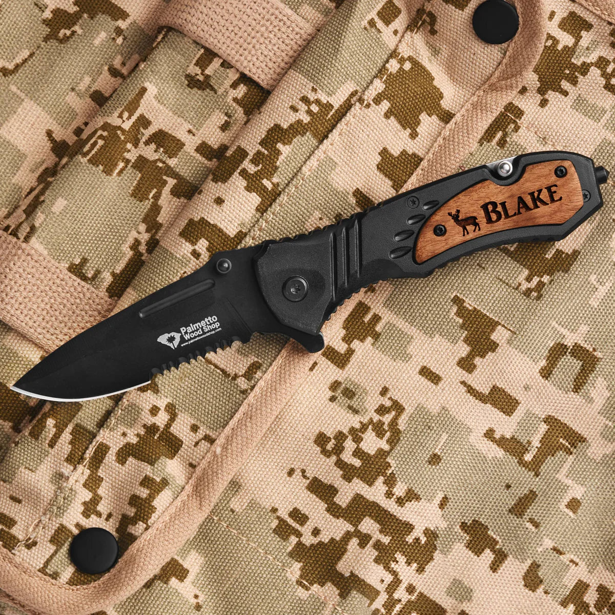 engraved palmetto wood shop pocket knife on a digi camo background