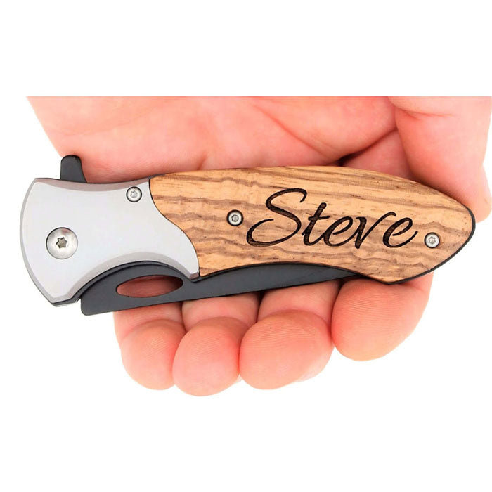 hand holding laser engraved pocket knife